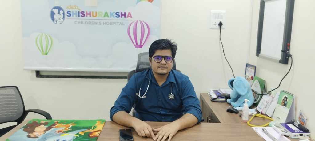 Dr. Balaji Varvatte at his desk at Namma Shishuraksha Children’s Hospital, Bidar.
